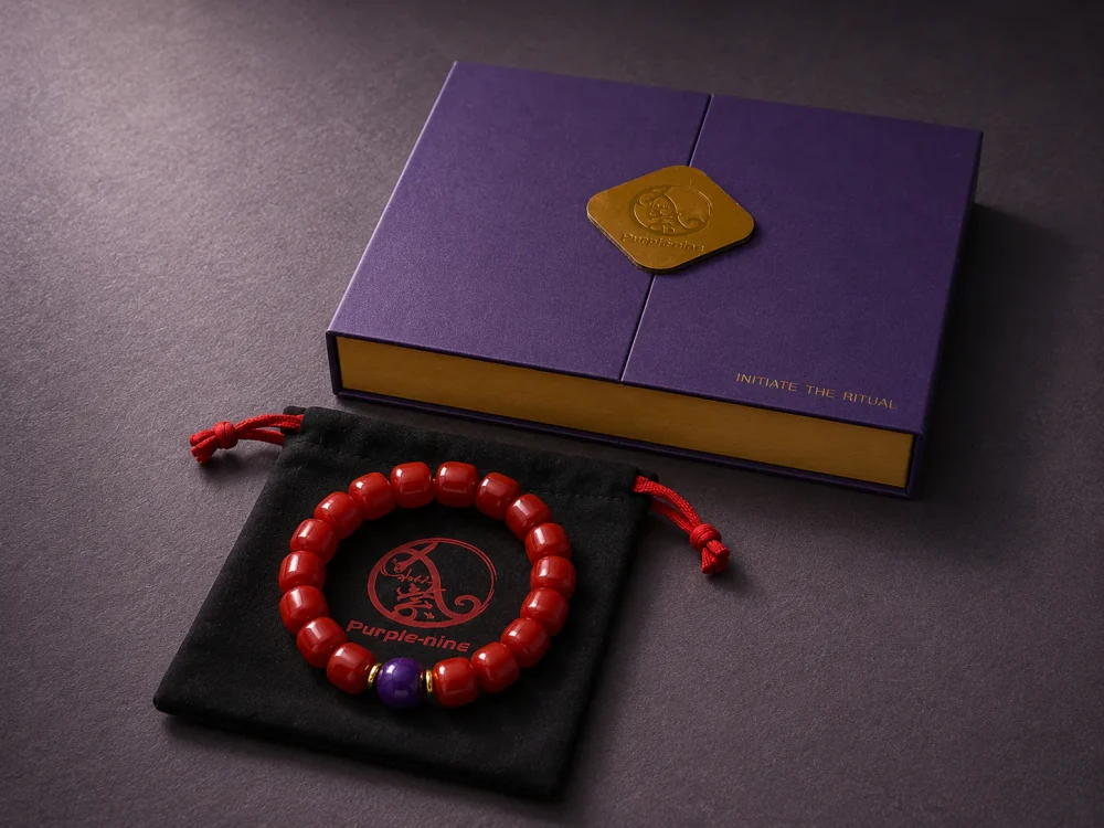 Fire Radiance bracelet with Nanhong agate beads, purple amethyst center bead, purple 9Purple gift box, and black drawstring pouch