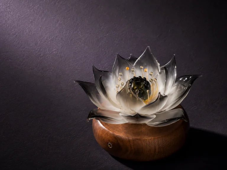 9Purple luxury handcrafted Liuli glass lotus flower lamp featuring frosted white and smoky black ink wash gradient petals on a rounded dark walnut base.