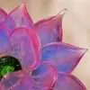 Rosefire Lotus rose-toned glass lotus light with magenta petal edges and blue-violet translucent petals