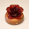 Vermilion Rose red glass rose light with layered vermilion petals on a warm wood display base