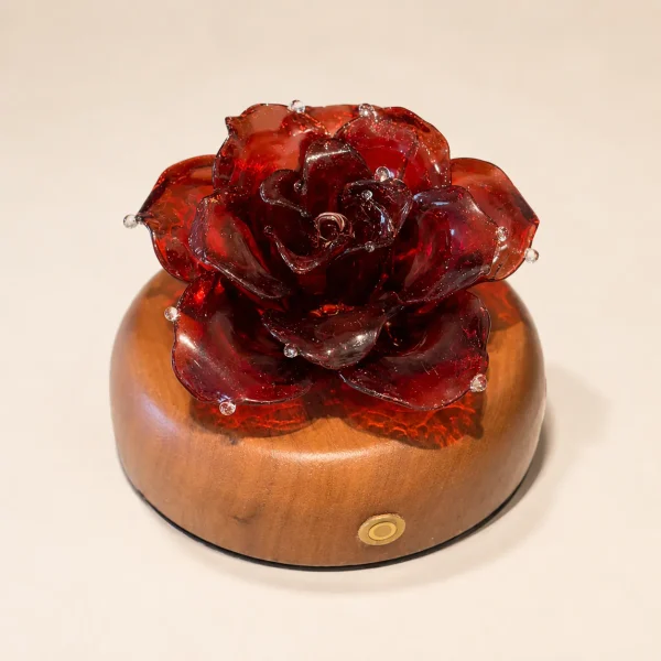 Vermilion Rose Red Glass Rose Light Vermilion Rose red glass rose light with layered vermilion petals on a warm wood display base