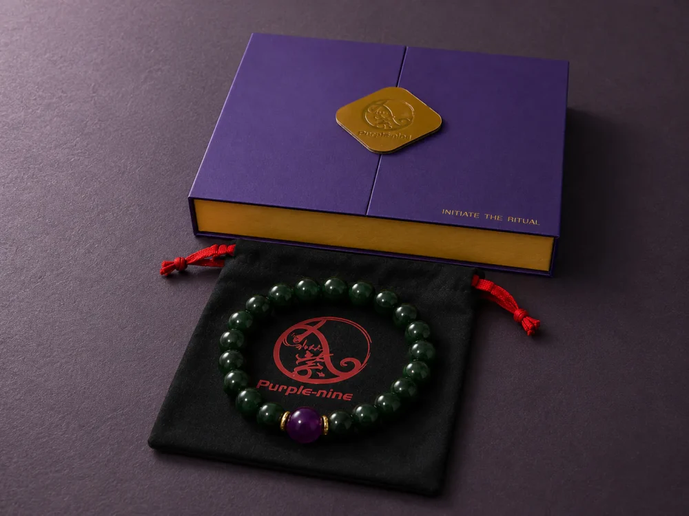 Wood Renewal Ganqing Jade Amethyst Bracelet Packaging Wood Renewal bracelet with Ganqing jade beads, purple amethyst center bead, purple 9Purple gift box, and black drawstring pouch