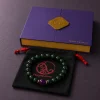Wood Renewal Ganqing Jade Amethyst Bracelet Packaging Wood Renewal bracelet with Ganqing jade beads, purple amethyst center bead, purple 9Purple gift box, and black drawstring pouch