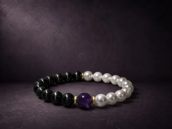 9purple-yin-yang-obsidian-pearl-amethyst-bracelet-hero 9Purple luxury Yin-Yang bracelet featuring black cat's eye obsidian, lustrous natural pearl, and 18k gold-filled spacer beads.