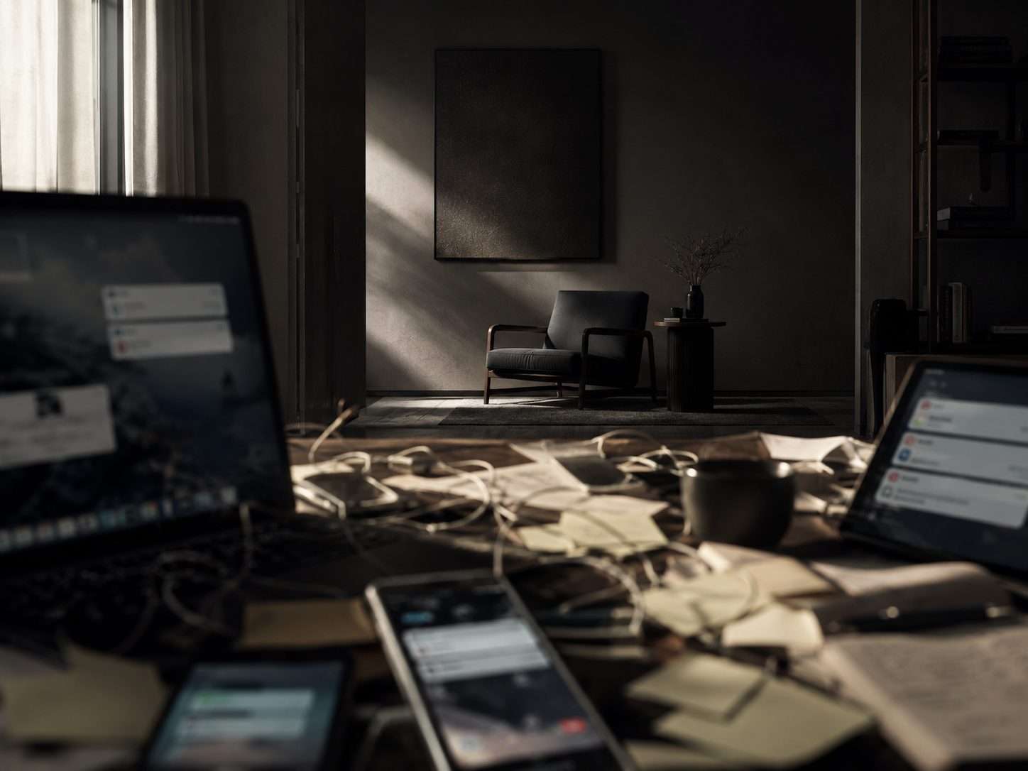 A minimal interior utilizing intentional space with deep chiaroscuro shadows and natural stone and dark wood textures