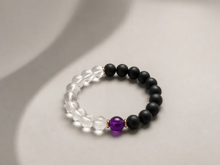 Yin-yang balance bracelet with black obsidian and white crystal symbolizing harmony and balance