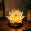 Illuminated Nine-Tailed Fox Lotus Light glowing in a calm modern interior at night.