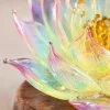 Macro detail of the translucent pink-edged iridescent petals on the Nine-Tailed Fox Lotus Light.