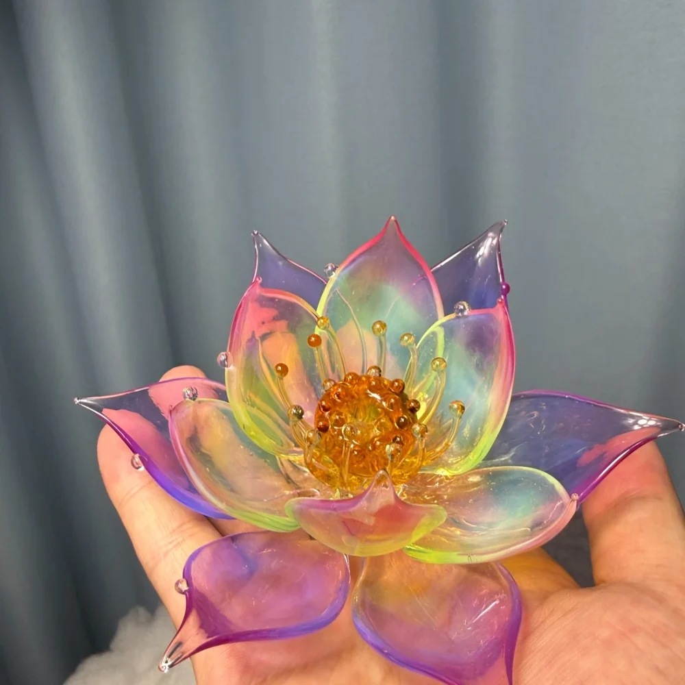 Prism Lotus — Hand-Held Scale Reference Prism Lotus held in one hand to show its actual size and handmade glass proportions
